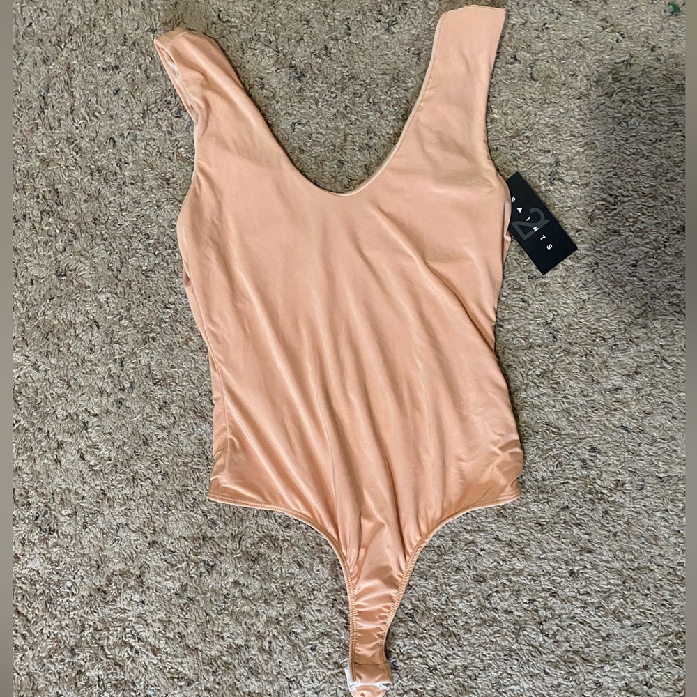 M peach bodysuit